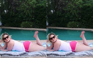 Sizzling blonde MILF lubes up her massive tits and fingers herself senseless by the poolside