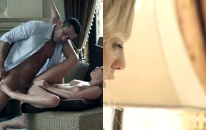 Seductive brunette indulging in foot worship and moaning with pleasure on the couch